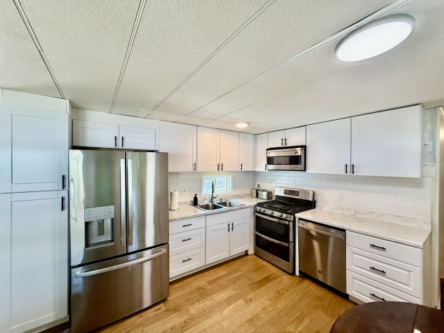 127 Aristides St, Dunedin, Florida 34698, 2 Bedrooms Bedrooms, ,1.5 BathroomsBathrooms,55-Plus Mobile Home,For Sale,Aristides St,4713